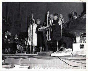  Singing at the Ryman auditorium. JD Sumner is playing guitar on the left. 